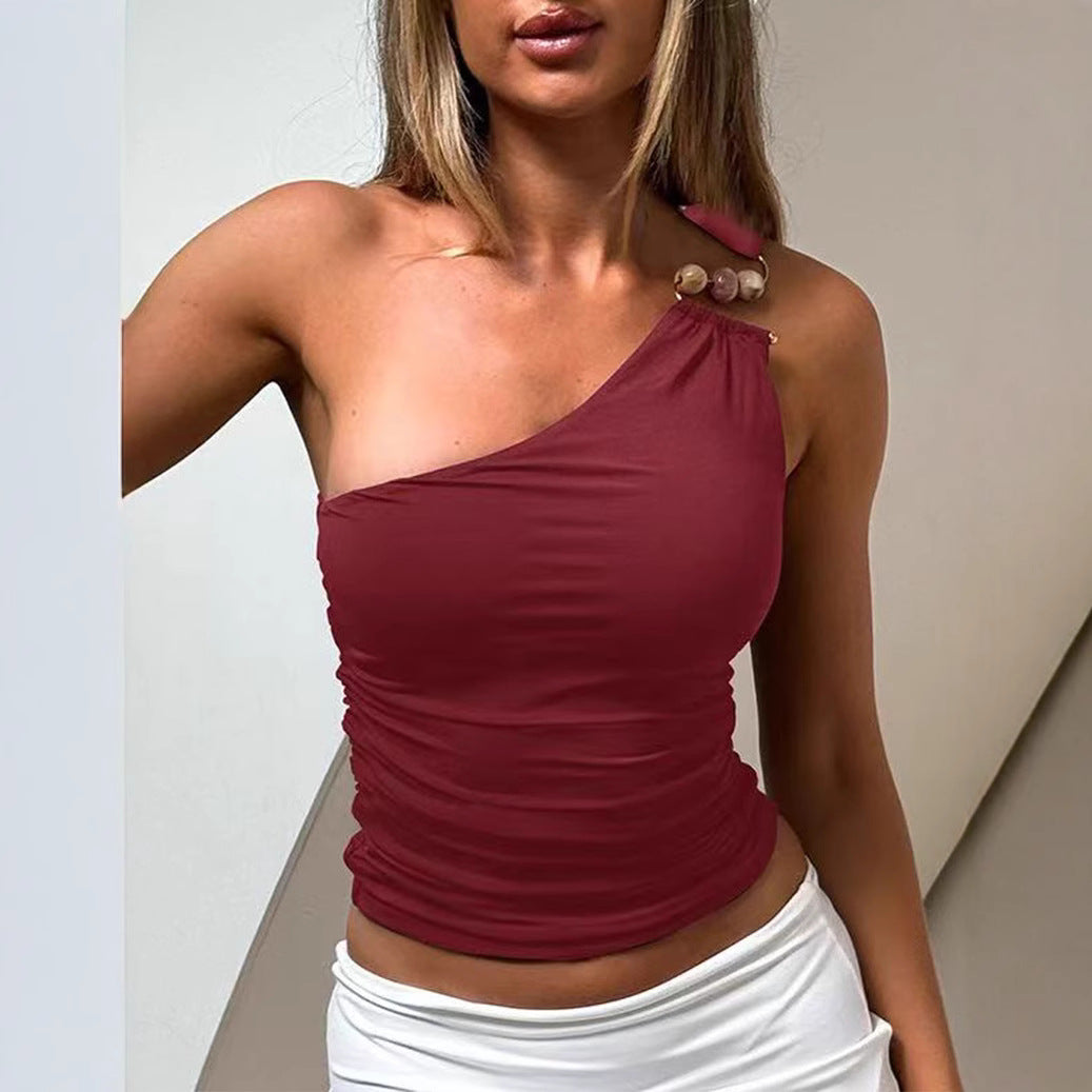 Asymmetrisk topp för kvinnor med stiliga detaljer