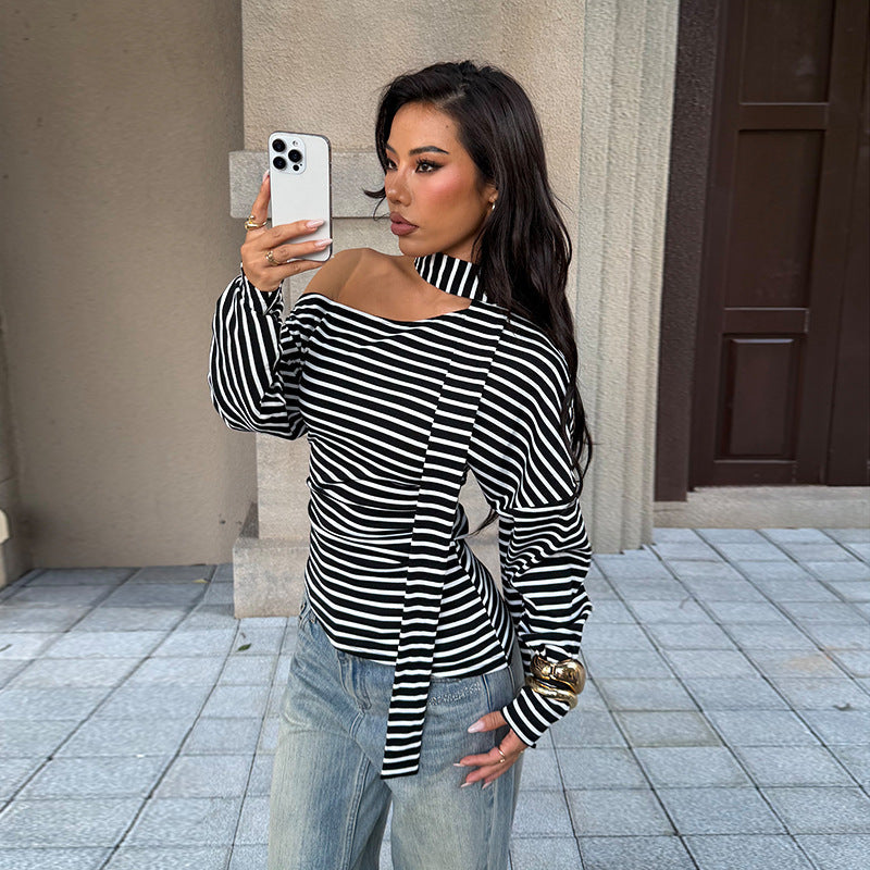 Asymmetrisk blus med axelbar design och stilfull knut