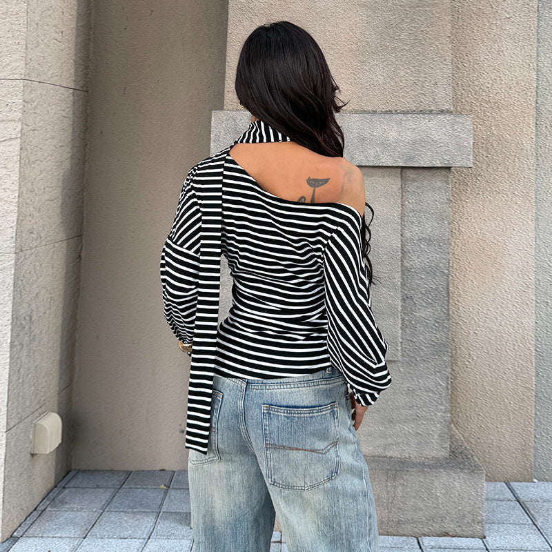 Asymmetrisk blus med axelbar design och stilfull knut