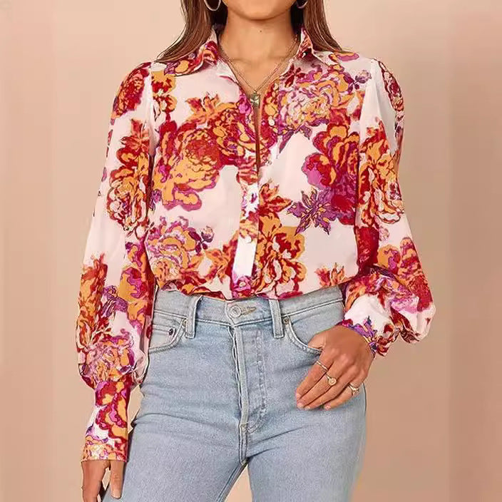 Elegant blus med djurtryck och lös silhuett