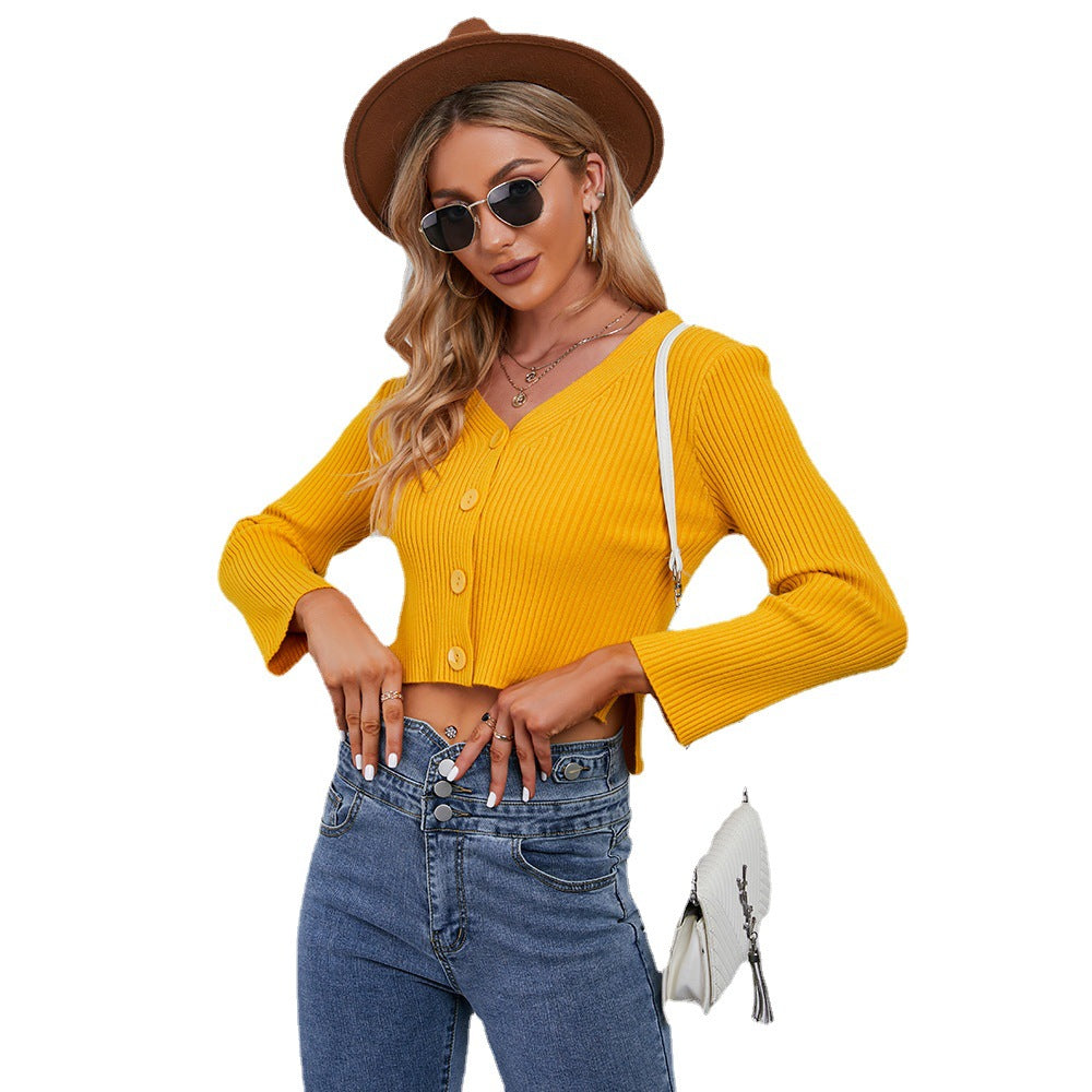 Stilfuld Cropped Strikjakke med Elegante Detaljer