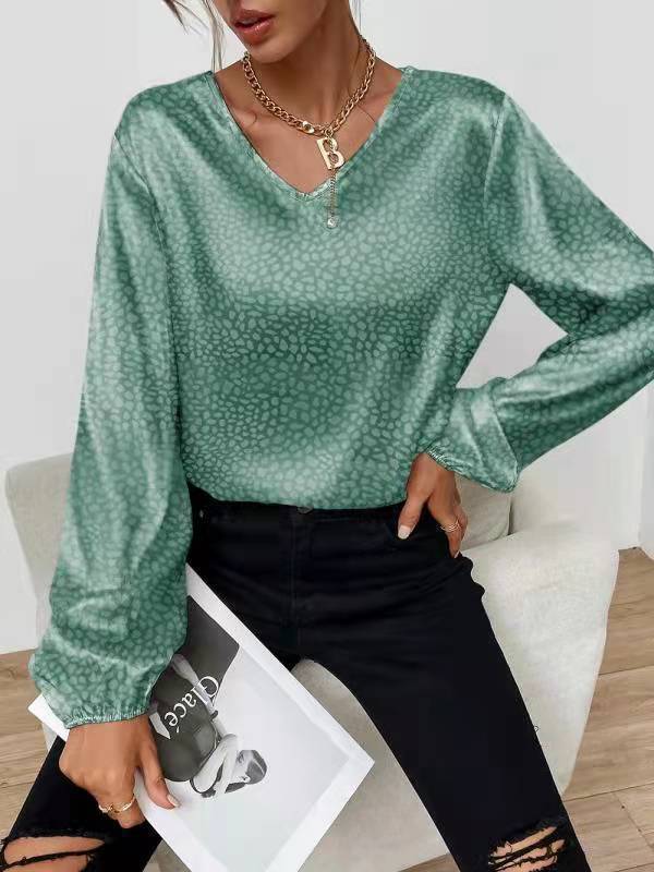 Moderne Bluse med V-Udskæring og Unikt Design