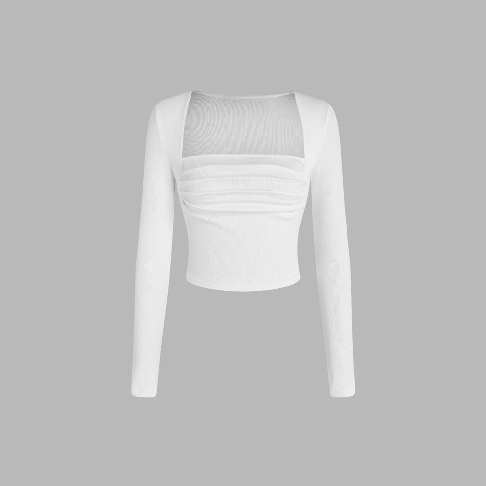 Stilfuld cropped langærmet bluse med elegant drapering