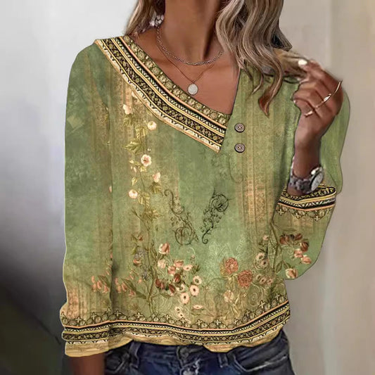 Blommig blus med V-ringning och eleganta detaljer