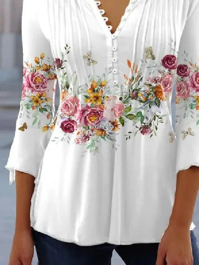 Elegant Blus med Blommigt Tryck och Knappsymfoni