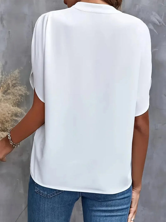 Elegant blus med v-ringning och lätt passform