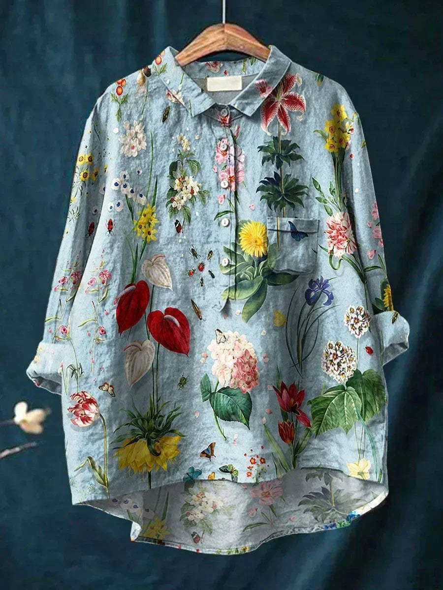 Livia - Elegant Blus med Blommig Design och Avslappnad Passform