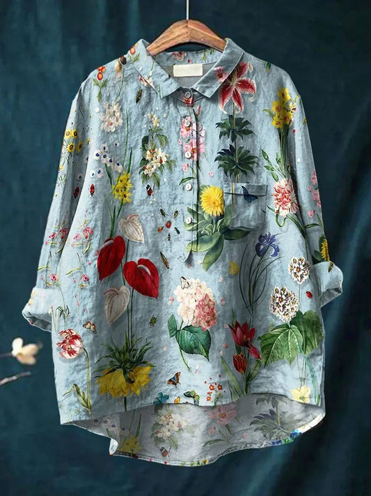 Livia - Elegant Blus med Blommig Design och Avslappnad Passform