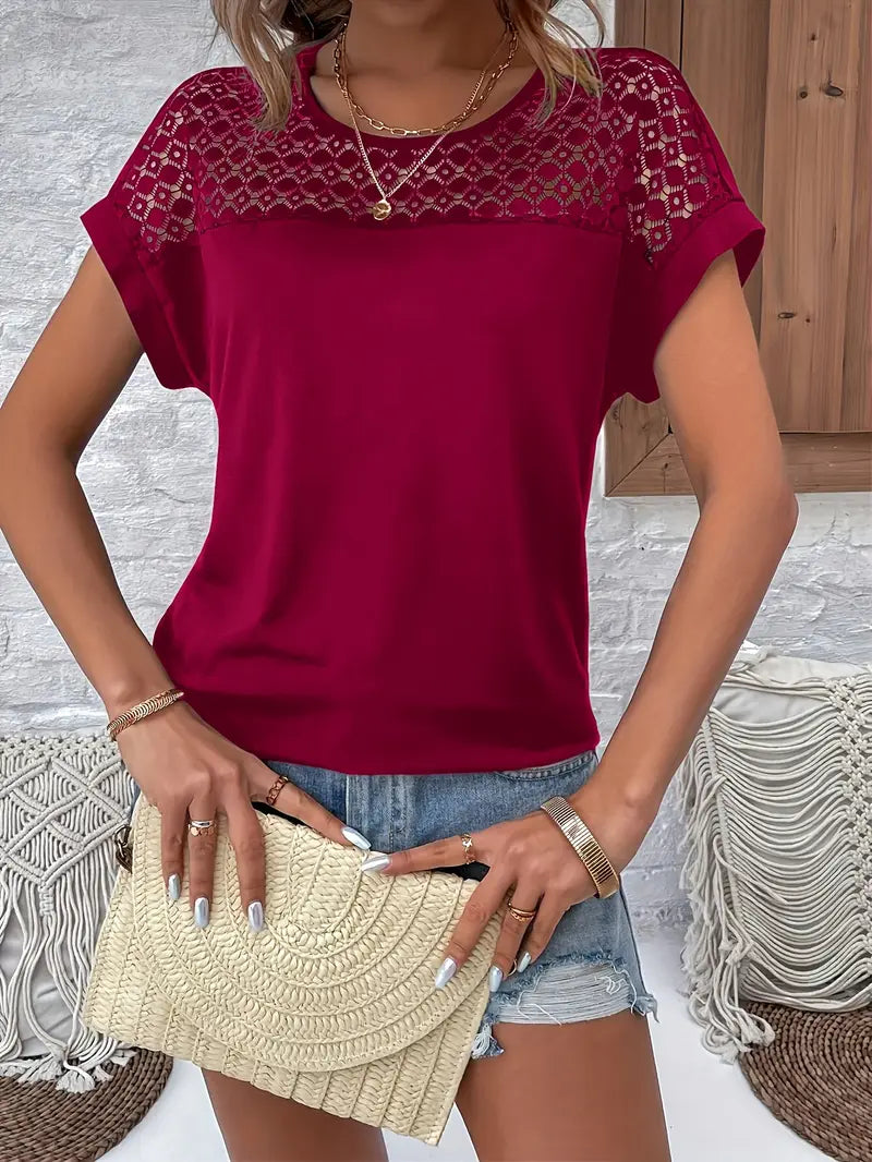 Feminint Batwing-Top med Blommig Spetsdetalj