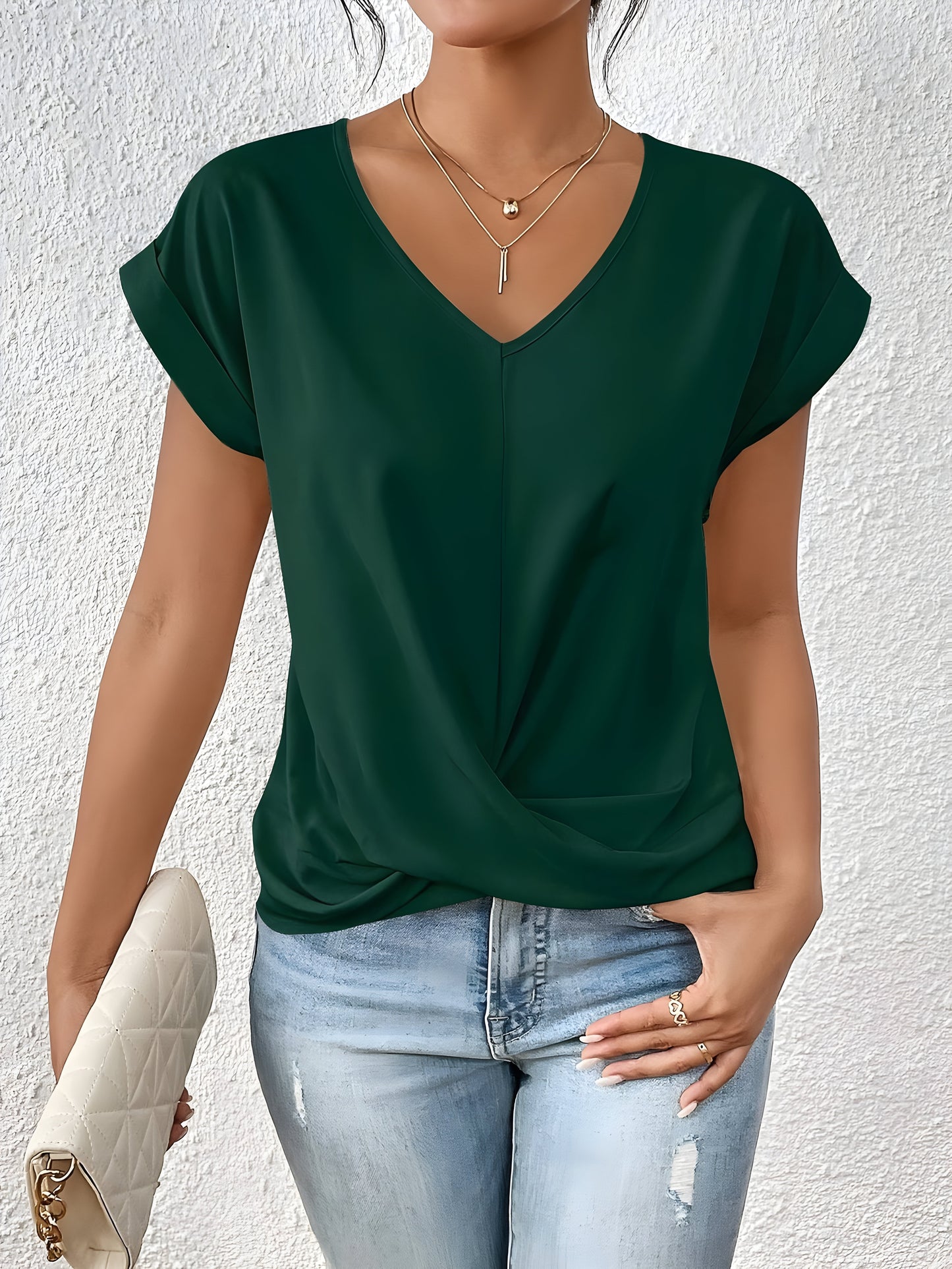 Chic V-ringad Blus med Vridning för En Smickrande Silhuett