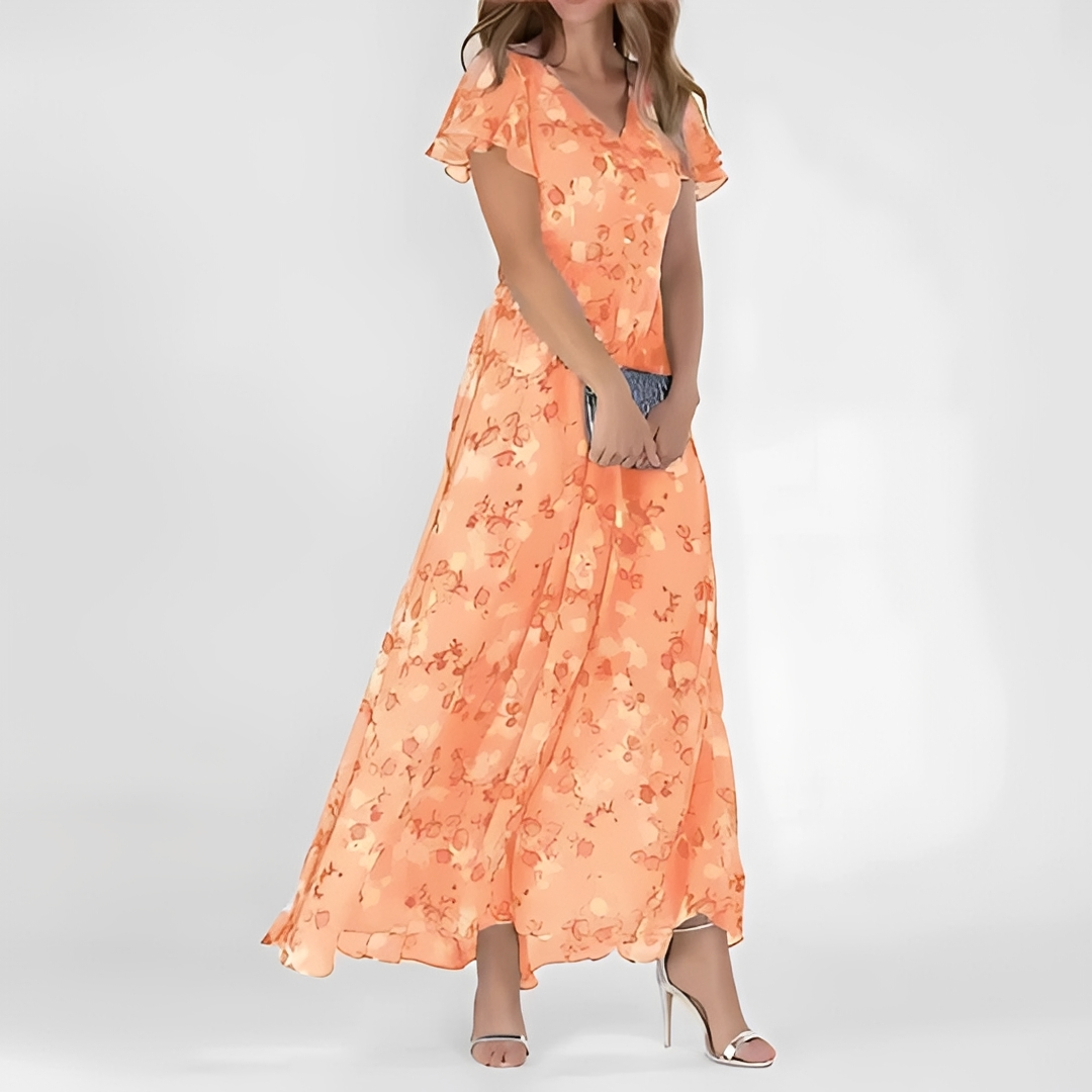 Floralt Chic Klänning för Sommarens Eleganta Stunder