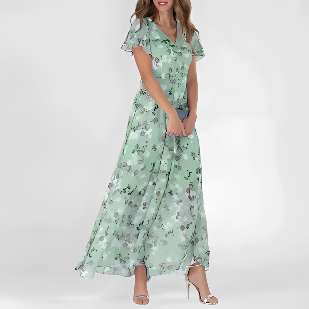 Floralt Chic Klänning för Sommarens Eleganta Stunder