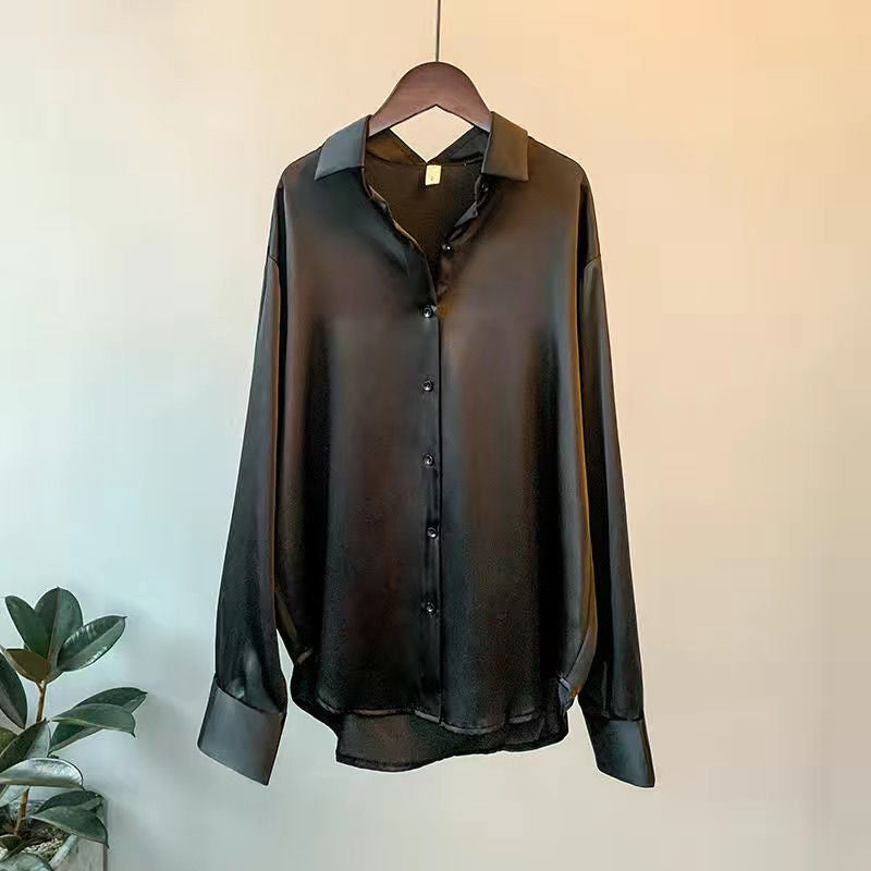 Damblus med lång ärm i satinliknande material