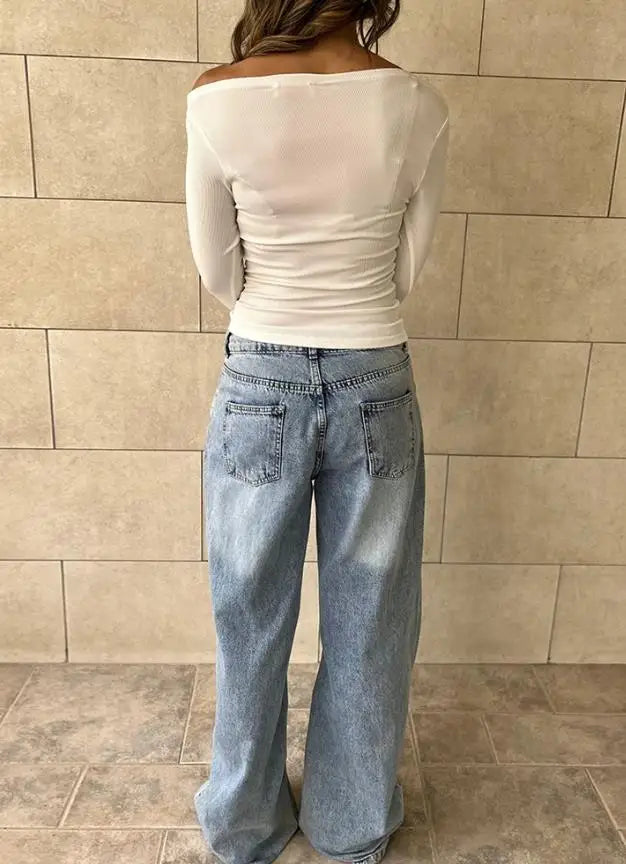 Feminine langærmet bluse med off shoulder-design