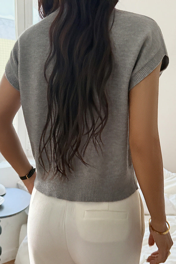 Elegant ærmeløs strikbluse med V-hals