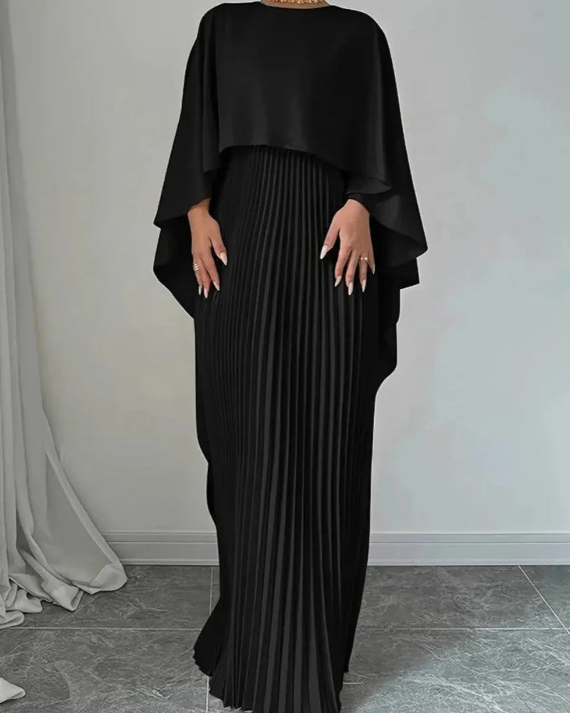 Aftenkjole lang – Plisseret struktur og flydende silhuet til festlige anledninger