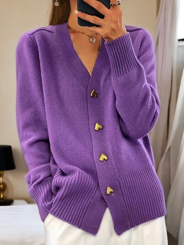 Chic strikcardigan med knapdetaljer og tidløs elegance