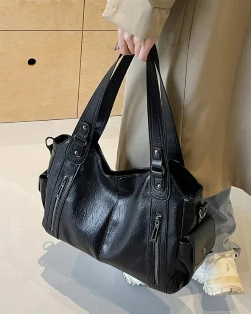 Dame- skuldertaske – rummelig og stilfuld med justerbar rem