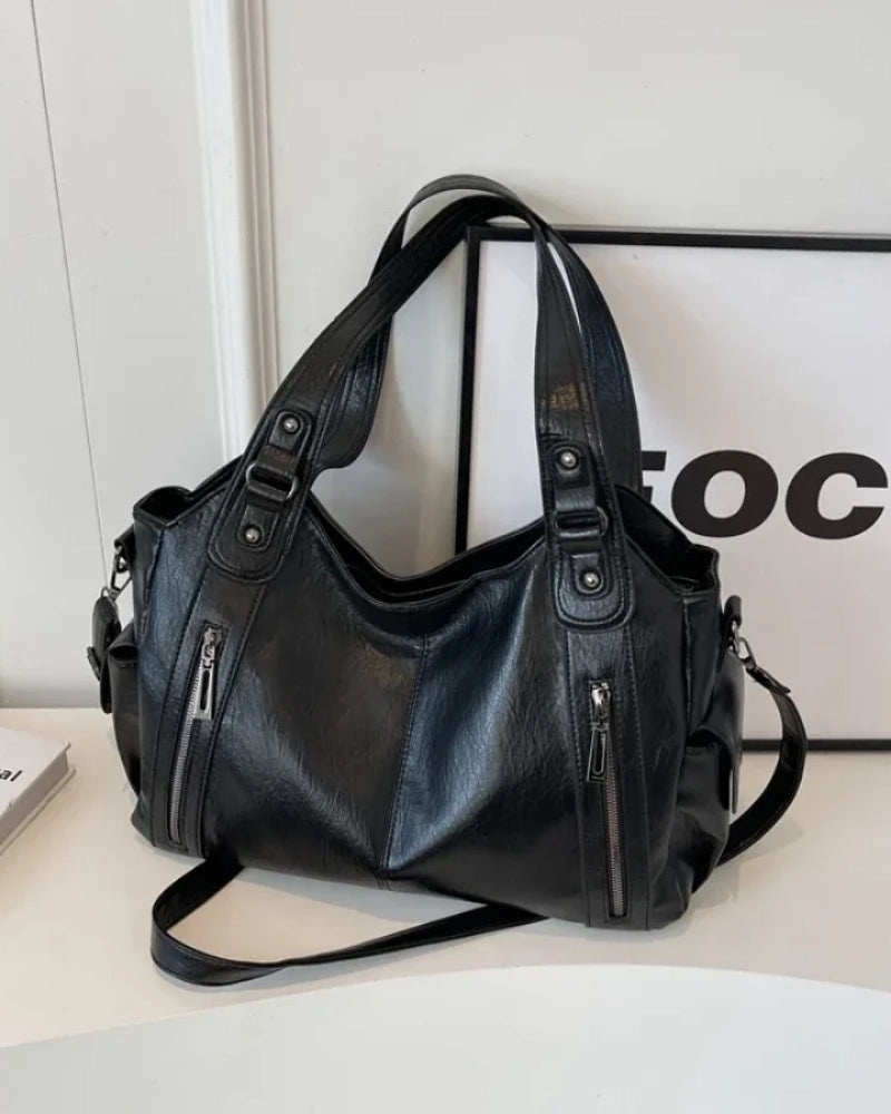 Dame- skuldertaske – rummelig og stilfuld med justerbar rem