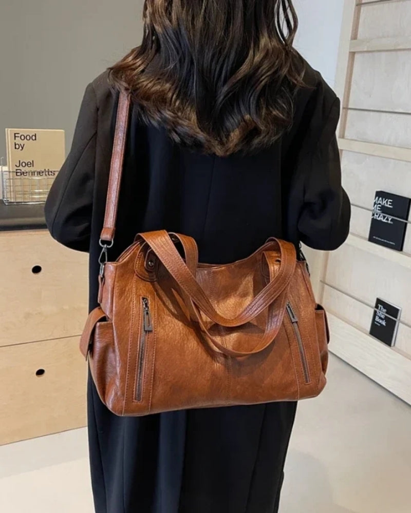 Dame- skuldertaske – rummelig og stilfuld med justerbar rem