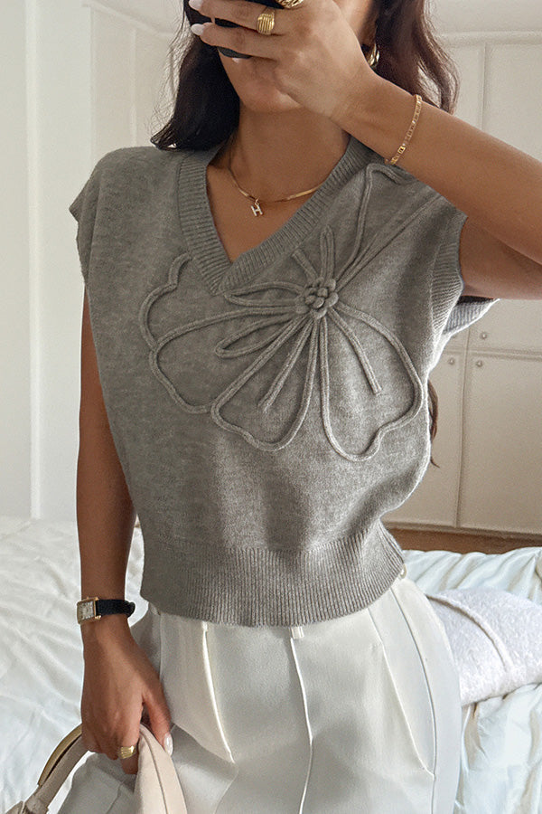 Elegant ærmeløs strikbluse med V-hals