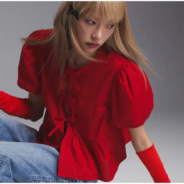 Chic Bluse med Puffærmer og Sløjfedetaljer