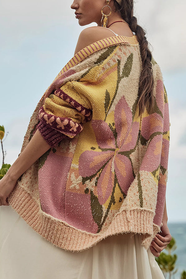 Elegant og blød cardigan med blomsterdesign og rummelig pasform