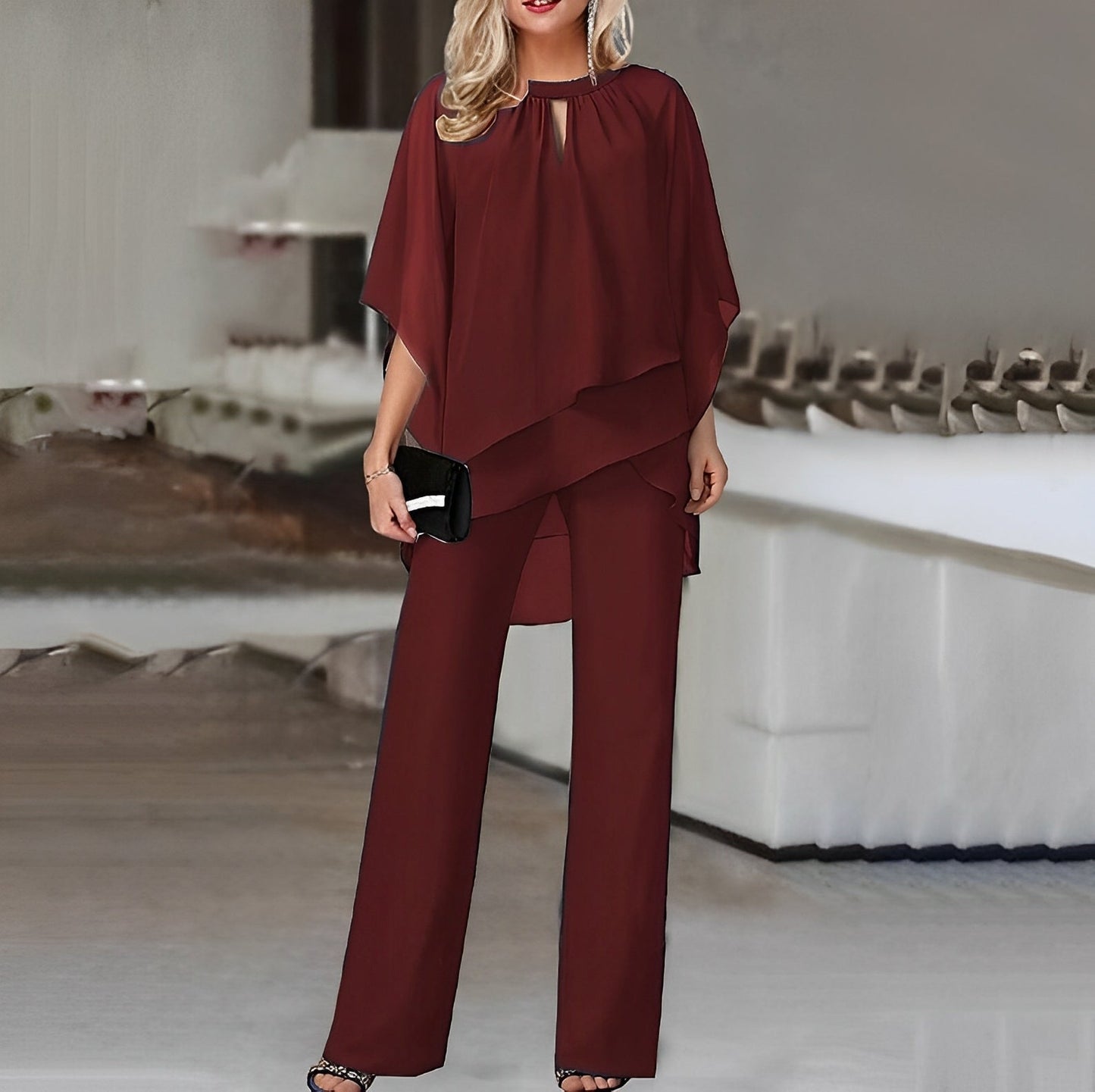 Sofistikeret to-delt jumpsuit med unik overdel