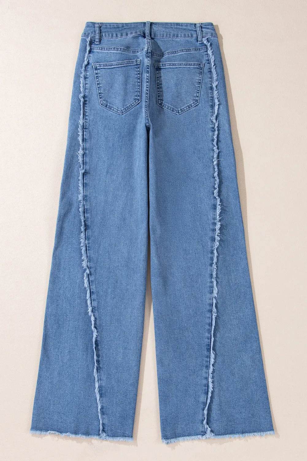 Moderne Denim Bukser med Ufer og Løse Ben