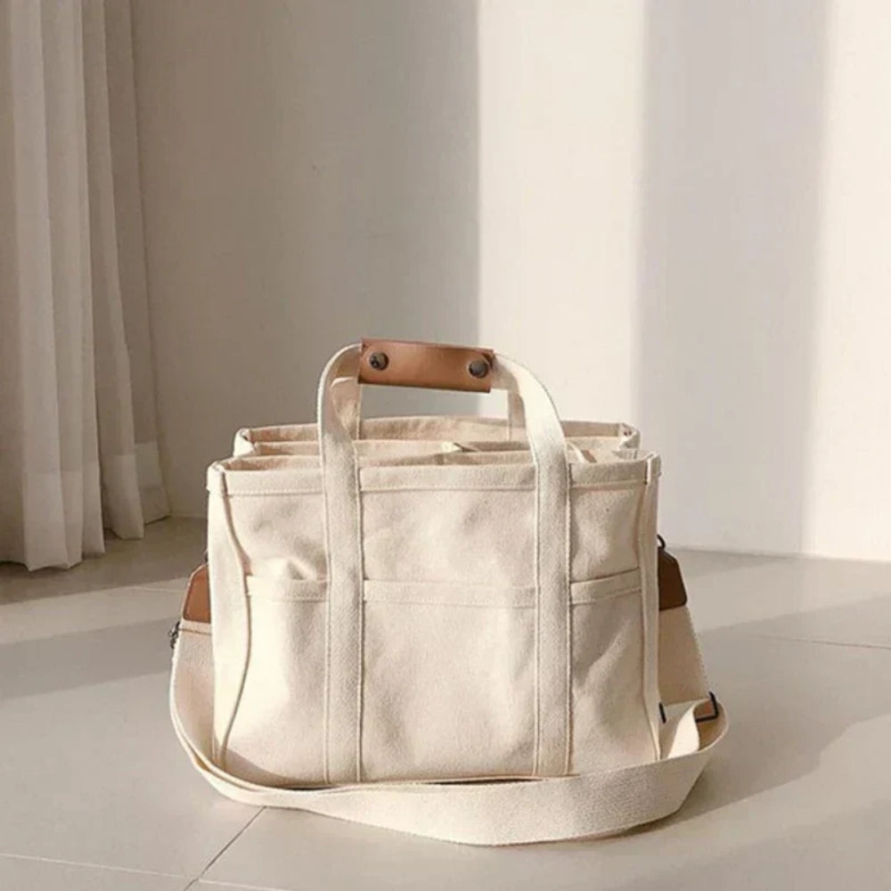 Stor canvas skuldertaske - Crossbody-design med praktiske rum