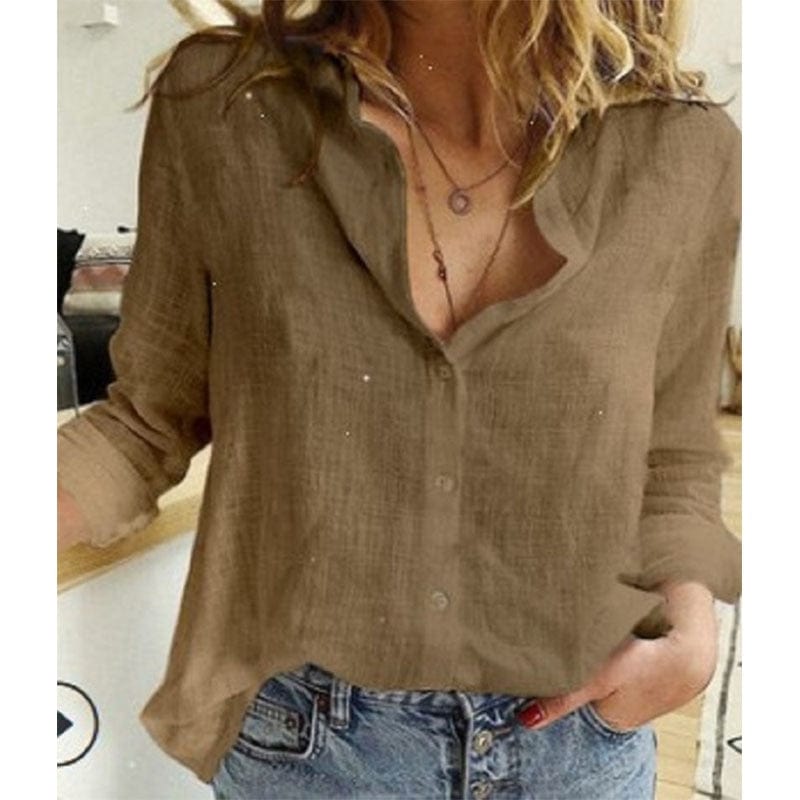Elegant Bluse med V-Hals og Unikke Knapdetaljer
