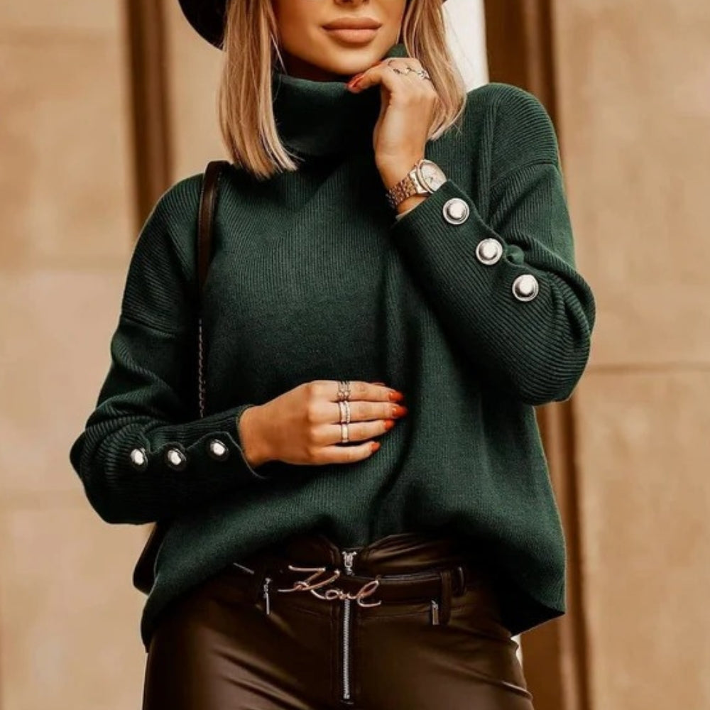 Rullekrave sweater til damer med knaplukning ved ærmet
