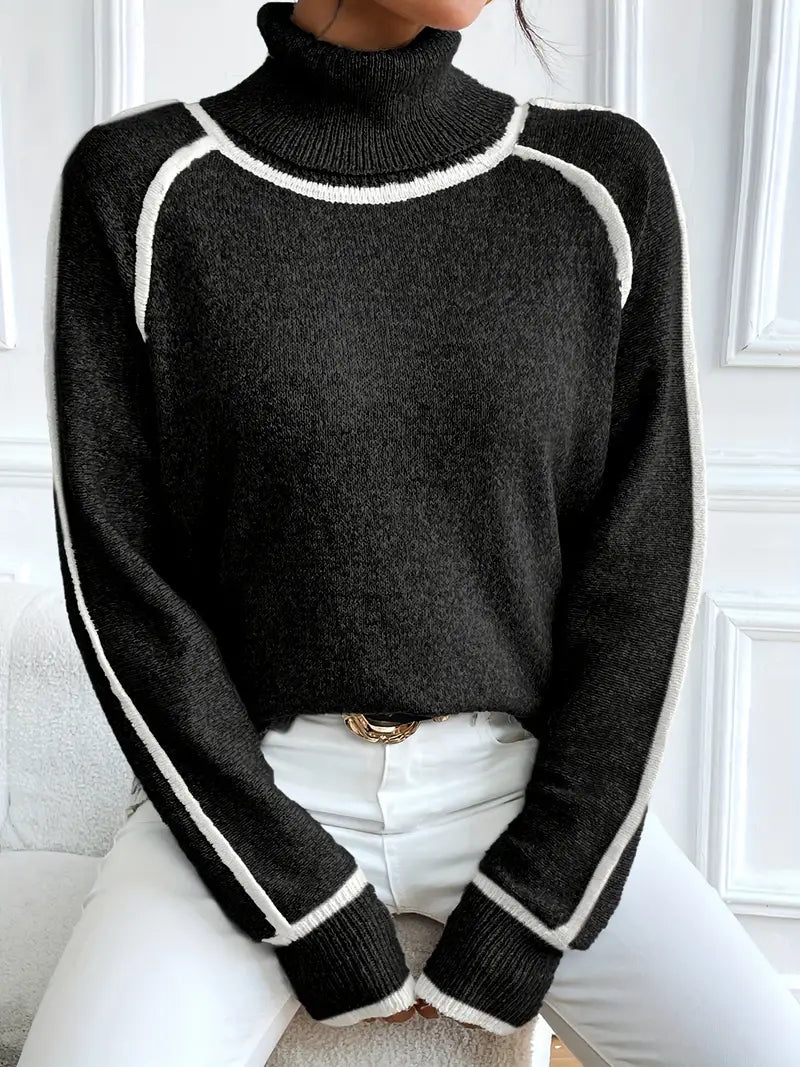 Elegant stickad tröja med hög krage och unika detaljer