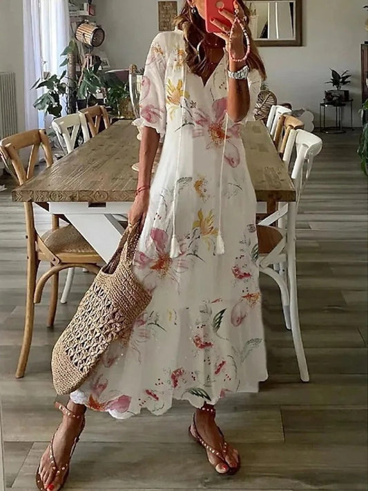 Sommarklänningar för kvinnor med blommönster och V-ringning
