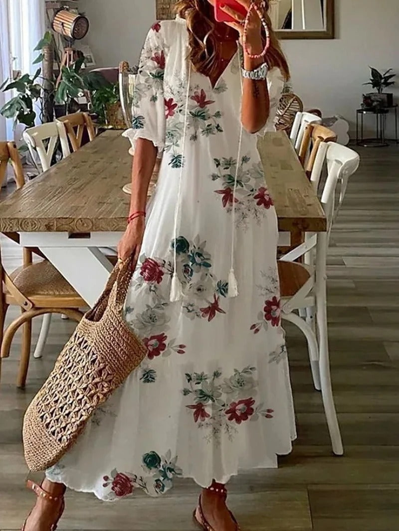 Sommarklänningar för kvinnor med blommönster och V-ringning